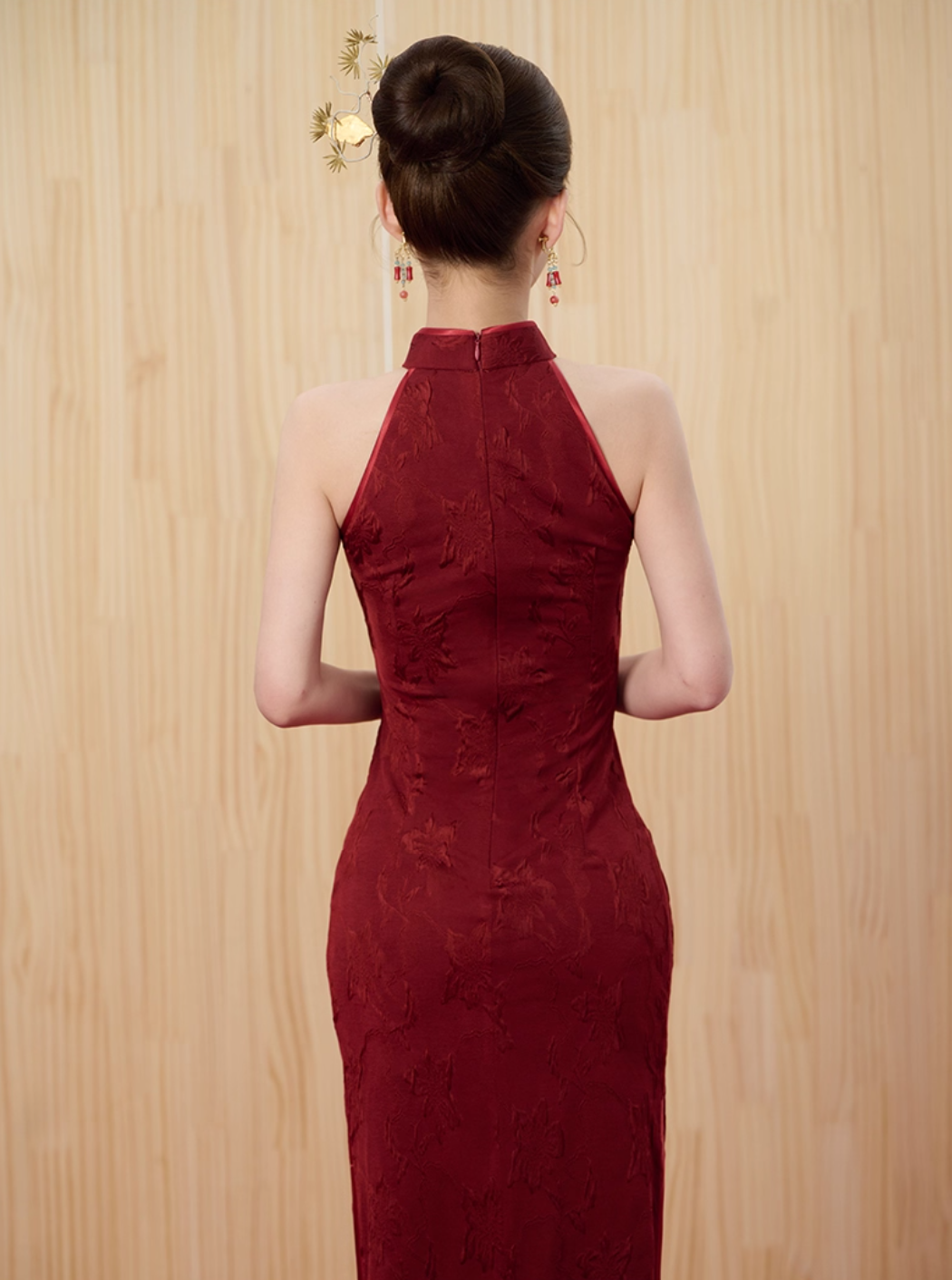  back side of a wine-red jacquard Qipao dress 